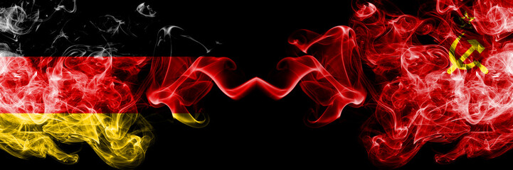 Germany vs USSR, Communist smoky mystic flags placed side by side. Thick colored silky smoke flags of Deutschland and USSR, Communist