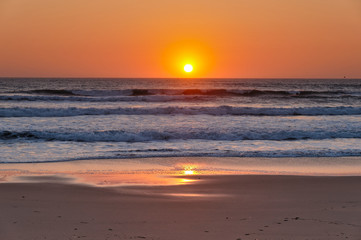 Beautiful Sunset in Areias Brancas beach in Lourinha, Portugal