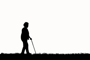 Silhouette elderly walking, relaxing on the lawn. 