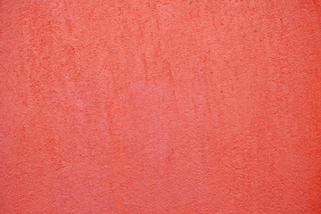 Red Painting on Raw Concrete Wall Texture Background.