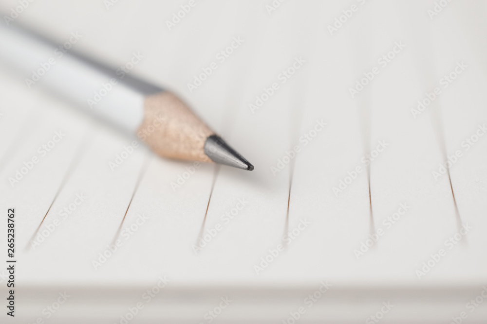 Poster gray pencil point to the empty area of note paper