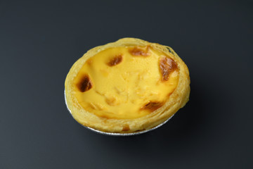 Closeup for egg tart on a dark background