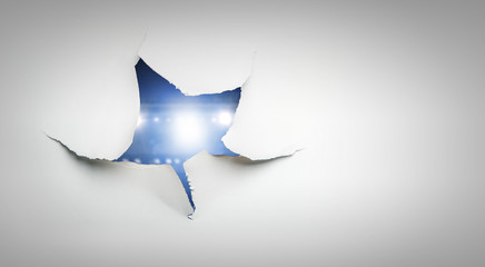 Paper torn hole effect with stadium view