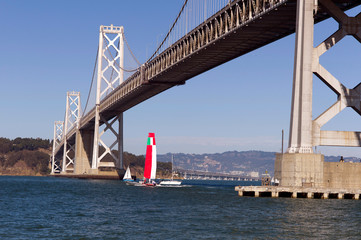 bay bridge and sail boat in san francisco