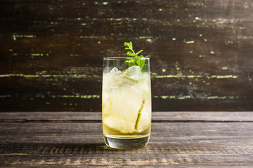 Sweet rum based cocktail with mint. Selective focus. Shallow depth of field.