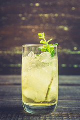 Sweet rum based cocktail with mint. Selective focus. Shallow depth of field.