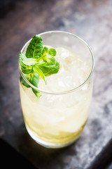 Sweet rum based cocktail with mint. Selective focus. Shallow depth of field.