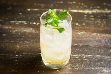Sweet rum based cocktail with mint. Selective focus. Shallow depth of field.