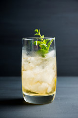 Sweet rum based cocktail with mint. Selective focus. Shallow depth of field.