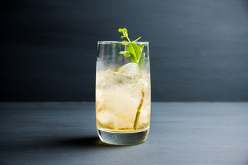 Sweet rum based cocktail with mint. Selective focus. Shallow depth of field.