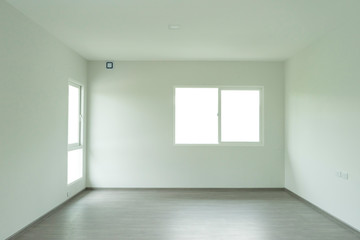 Fototapeta premium Empty room of a house with door and window.