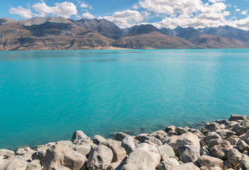 lake Pukaki in Mackenzie Basin with Souther Alps in background, South Island, New Zealand