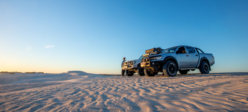 watching sunset on a sand dunes