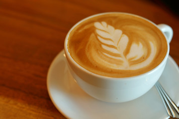 hot latte coffee in cafe