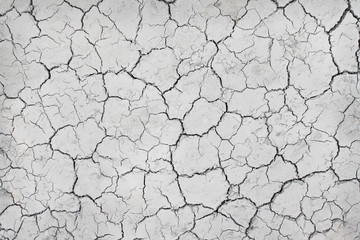 Cracked soil ground texture top view , line nature drought seamless patterns grey white background