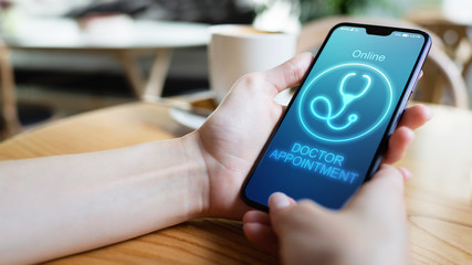 Online Doctor appointment on mobile phone screen. Medical and health care concept.