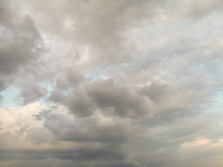Background of dark and gray clouds in the sky before rain.