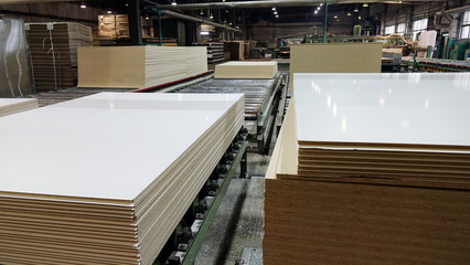 Production of laminated fiberboard. Fibreboard sheets for furniture production