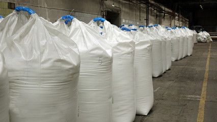 Bags of fertilizer in industrial production .