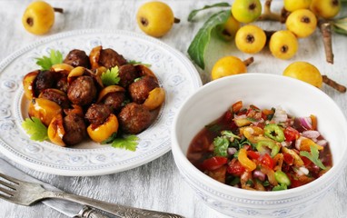 various dishes from medlars. meatballs with a loquat. fruit salsa with a loquat. recipes with a medlar. square format