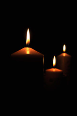 Candle light on dark room