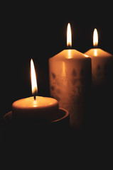 Candle light on dark room