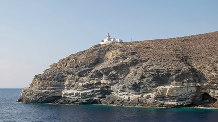 Fototapeta na wymiar lighthouse on a greek island in the mediterranean sea