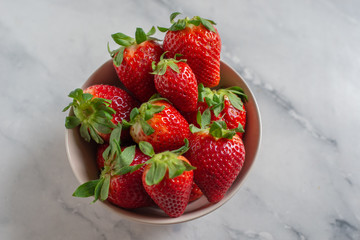 Loosely put the strawberries in different positions