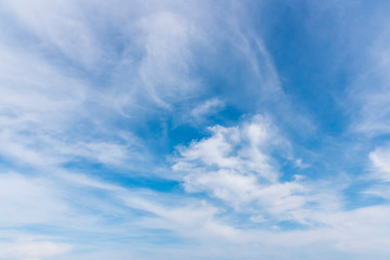Fototapeta premium Blue sky with close up white fluffy tiny clouds background and pattern