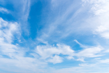 Blue sky with close up white fluffy tiny clouds background and pattern