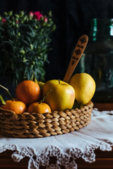 Still life of apples and tangerines