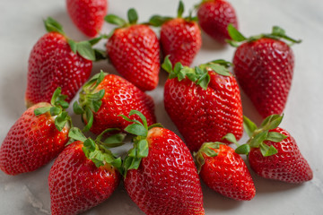 Loosely put the strawberries in different positions