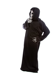 Person dressed in grim reaper or death ghost Halloween costume looking confused or undecided