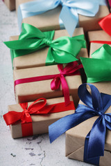 Gifting boxes with colorful satin ribbon bows	