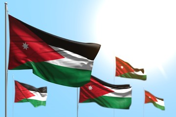 beautiful celebration flag 3d illustration. - 5 flags of Jordan are wave against blue sky image with selective focus