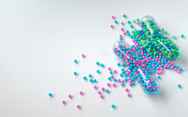 opened colorful pill capsule, 3d rendering,conceptual image.