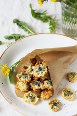 dandelion flowers fried in deep fried. Recipes from dandelion. organic healthy food. spring recipe. dishes from the first green.
