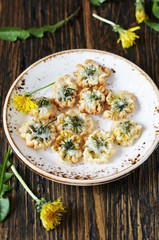 dandelion flowers fried in deep fried. Recipes from dandelion. organic healthy food. spring recipe. dishes from the first green.