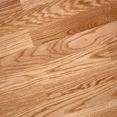 Fine natural solid valuable species of wood laminate parquet floor texture background. Wooden boards painted with natural oil, wax or mastic.