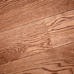 Fine natural solid valuable species of wood laminate parquet floor texture background. Wooden boards painted with natural oil, wax or mastic.