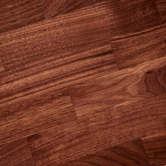 Fine natural solid valuable species of wood laminate parquet floor texture background. Wooden boards painted with natural oil, wax or mastic.
