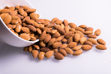 Almonds in a bowl close-up. Healthy food.
