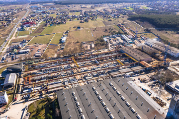 Aerial view from above of industrial buildings, warehouses or factory storages or logistic company