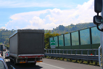 Slow-moving traffic before single-lane operation on highway due to road works