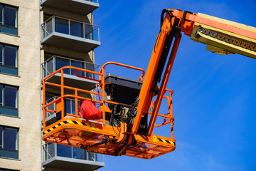 Basket lift on construction site