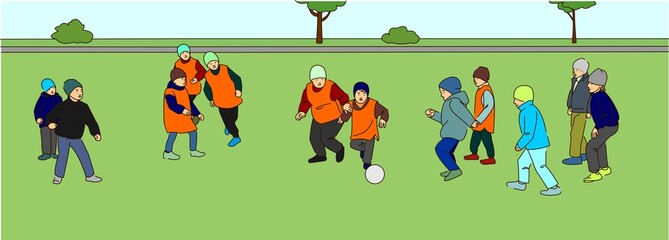 Fototapeta premium Children play football outdoors. The boys are kicking the ball.