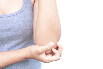 Closeup woman hand holding elbow with pain on white background, health care and medical concept