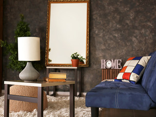 Stylish interior room with big mirror, table and couch