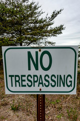 Solomons, Maryland, USA A no trepassing sign on the beach
