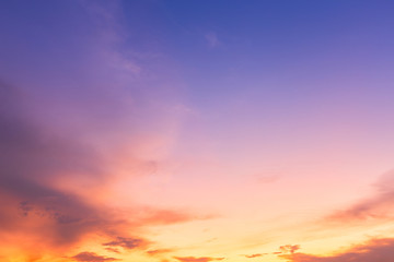 Fototapeta premium Orange sky background texture with white clouds sunset.